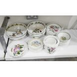 Three Portmeirion 'The Botanic Garden' pattern fruit and serving bowls, flan dish, various plates,