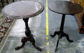 George III oak tilt-top tripod table with circular top and plain turned stem,