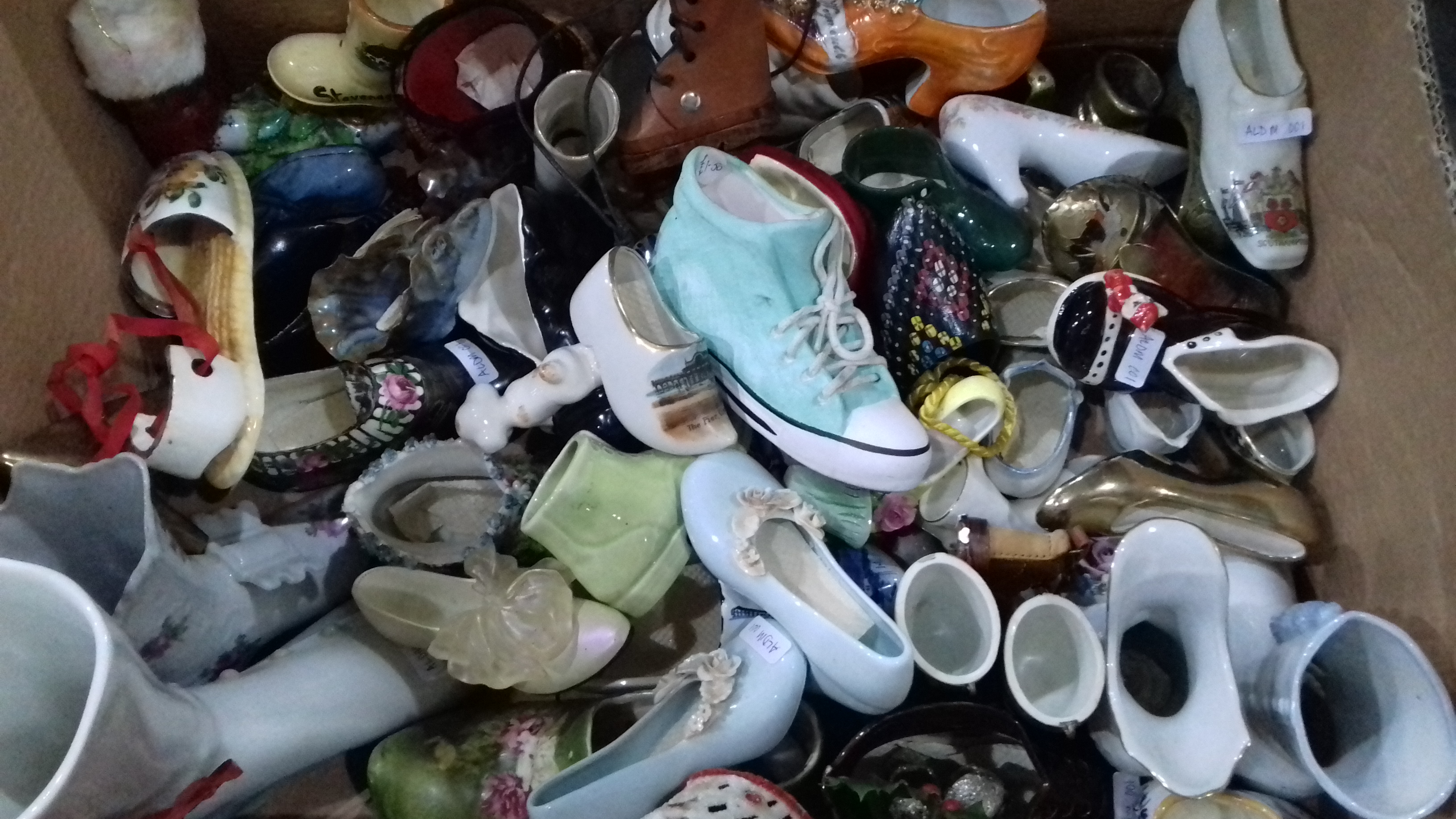 Large collection of ceramic shoes