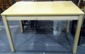 Pale wood rectangular-top table, on square legs,