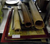 Various folded rolled prints, a tray etc.