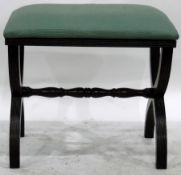 Reproduction dressing stool on 'x' frame supports, another on scroll end supports.