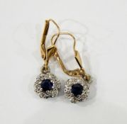 Pair of 18ct gold, diamond and sapphire flower-shaped drop earrings,