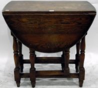 An oak gateleg table