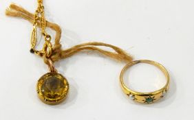 18ct gold necklace with yellow stone pendant and a gold ring set with turquoise stone flanked by