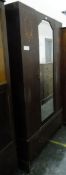 Edwardian mahogany wardrobe with inlaid decoration and central mirror door,