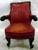 Early Victorian mahogany library armchair, the outswept arms with scroll decoration,