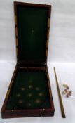 Stained wood folding table-top bar billiards with nine balls,