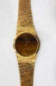 Lady's Buesche-Girod 9ct gold bracelet watch with the circular dial with circular tiger's eye