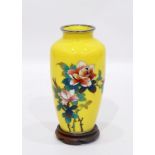 Japanese cloisonne vase of baluster form and decorated with roses on a bright yellow ground with