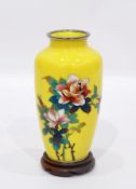 Japanese cloisonne vase of baluster form and decorated with roses on a bright yellow ground with