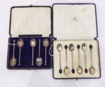 Set of six silver coffee bean ended coffee spoons (cased) and five silver seal-top spoons (cased)