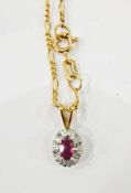 9ct gold, ruby and diamond cluster pendant on a 9ct gold chain, the oval central ruby 3mm x 5mm,