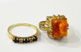 9ct gold ring set three blue and two white stones and a gold ring set amber (2)