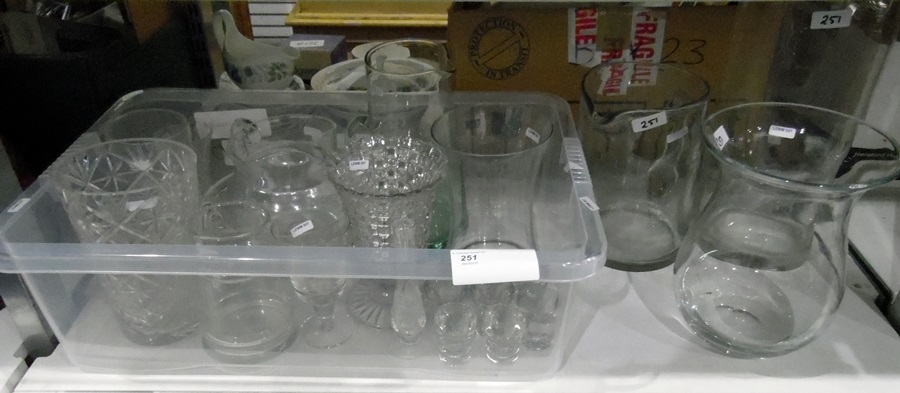 Assorted glassware including vases, jugs, shot glasses, bowls,