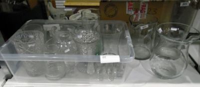 Assorted glassware including vases, jugs, shot glasses, bowls,