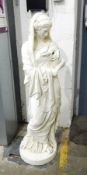 A painted metal Grecian female figure,
