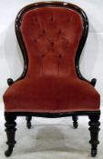 Mahogany balloonback nursing chair with button upholstery and walnut frame and a modern swivel