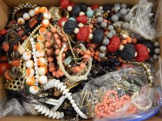 A quantity of costume jewellery to include necklaces, bangles,