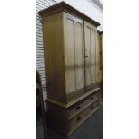 19th century stripped linen press, the pair of panelled doors enclosing trays,