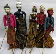 Set of five painted wood and fabric puppets and stand,