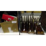 Three various brass and wooden magazine racks