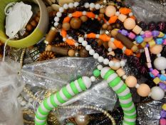 A quantity of costume jewellery to include beaded necklaces and bangles (1 box)