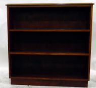 Mahogany open bookcase with moulded edge top, with three shelves, raised on a plinth base,