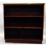 Mahogany open bookcase with moulded edge top, with three shelves, raised on a plinth base,