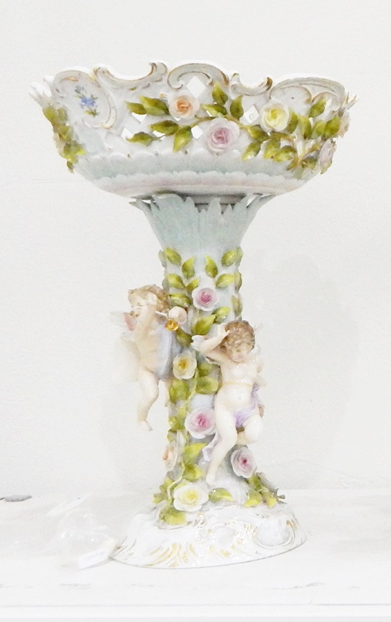 Volkstedt porcelain centrepiece comport, the basket with pierced scroll rose-encrusted border,
