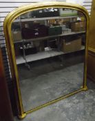 Victorian overmantel mirror within a moulded gilt frame,