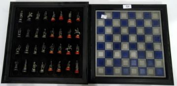 Chess set of enamelled pewter and brass-type metal chess pieces in the form of famous soldiers and