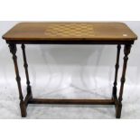 Victorian walnut games table, the rectangular top with chequerboard inlay,