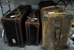 Two vintage leather suitcases,