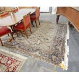 Indo-Persian ivory and blue carpet,