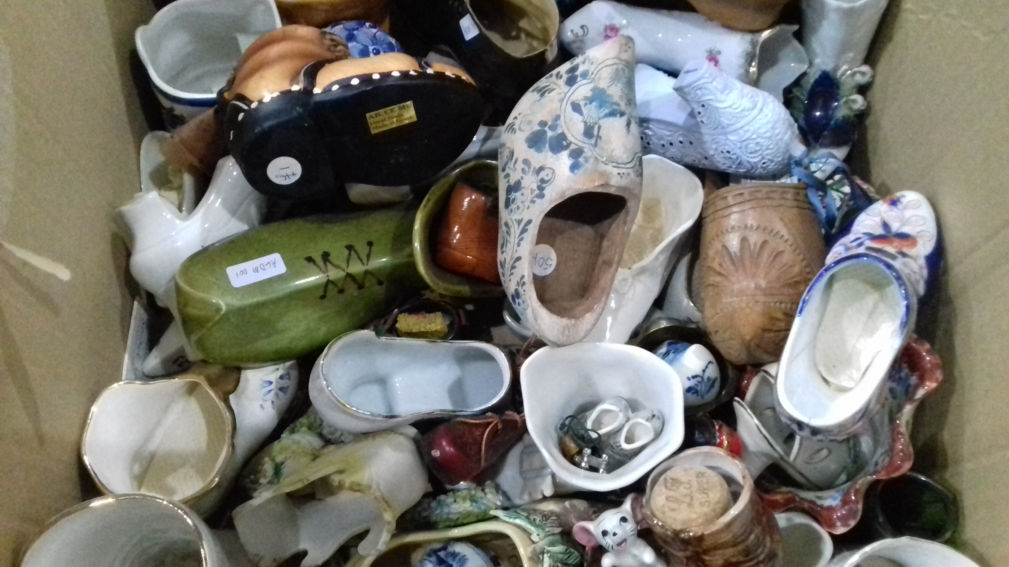 Large collection of ceramic shoes