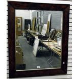 Large wall mirror with gilt slip within an oak frame