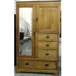 Late Victorian pale oak compactum, the mirror plate panel door enclosing hanging space,