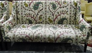 Large three seater sofa with high back,