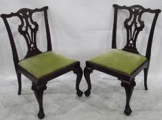 Set of eight mahogany boardroom chairs with pierced splats, cabriole legs,
