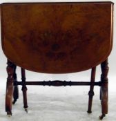 Late Victorian walnut veneered sutherland table, the top with moulded rounded borders,