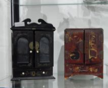 A Japanese black lacquer jewellery cabinet,
