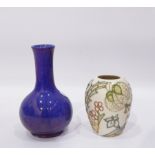 Moorcroft purple baluster shaped vase and another Moorcroft squat vase with incised floral