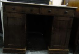 Victorian mahogany pedestal desk with inset writing surface, two frieze drawers,