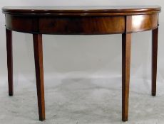 Late Georgian mahogany demi-lune foldover top tea table with plain frieze, on square tapering legs,