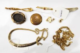 Various gold-coloured necklaces, chains, a cluster pendant, a Kered wristwatch,