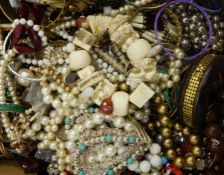 A quantity of costume jewellery to include simulated pearl necklaces, fashion necklaces,