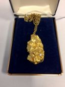 22ct gold marked nugget pendant, 46g set with brilliant cut diamond, approx 0.