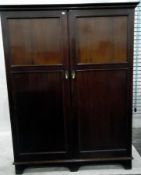 Early 20th century mahogany compactum, the pair of panelled doors enclosing hanging space,