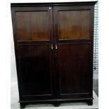 Early 20th century mahogany compactum, the pair of panelled doors enclosing hanging space,